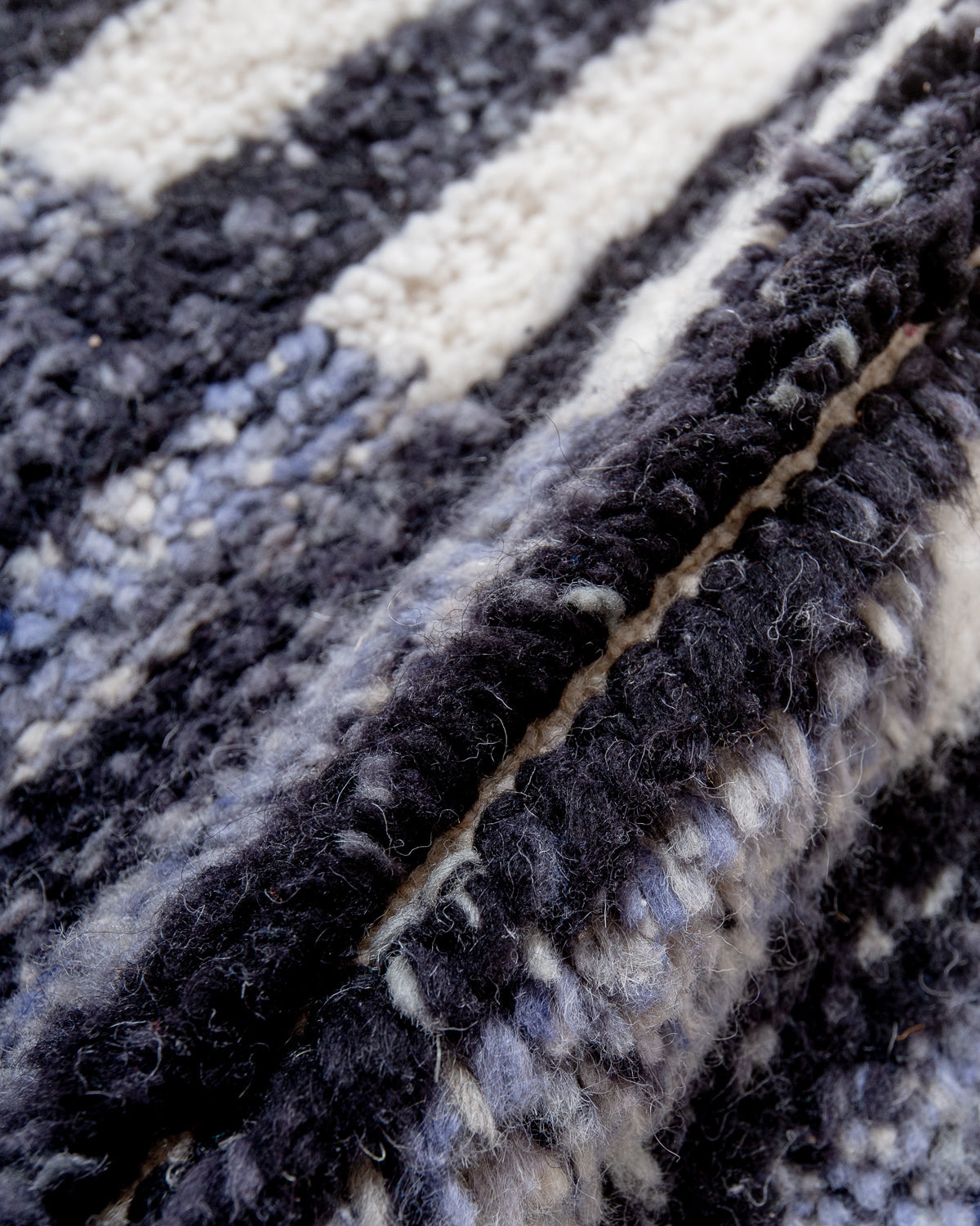 Modern, designer, handcrafted Berber rug from Morocco. Beniourain carpet with beautiful colours and patterns and fluffy wool texture.